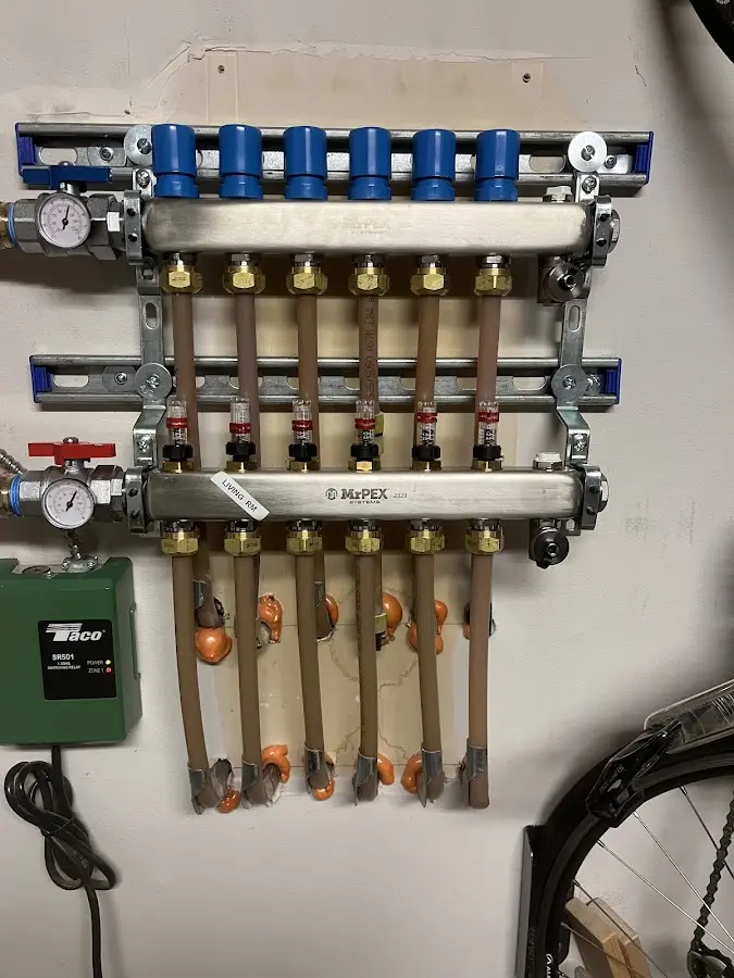 Plumber performing Water Heater Repair at a residential property in Greensboro