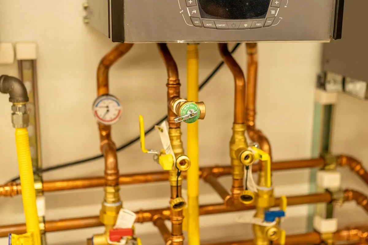 Licensed technician providing Backflow Prevention for a homeowner in Greensboro